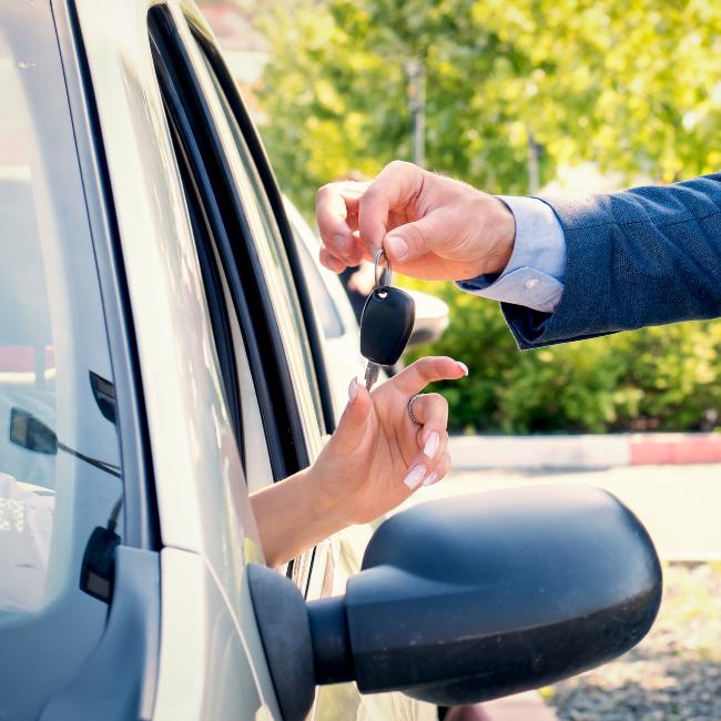 Car salesmen send car keys to new owners.Car rental.